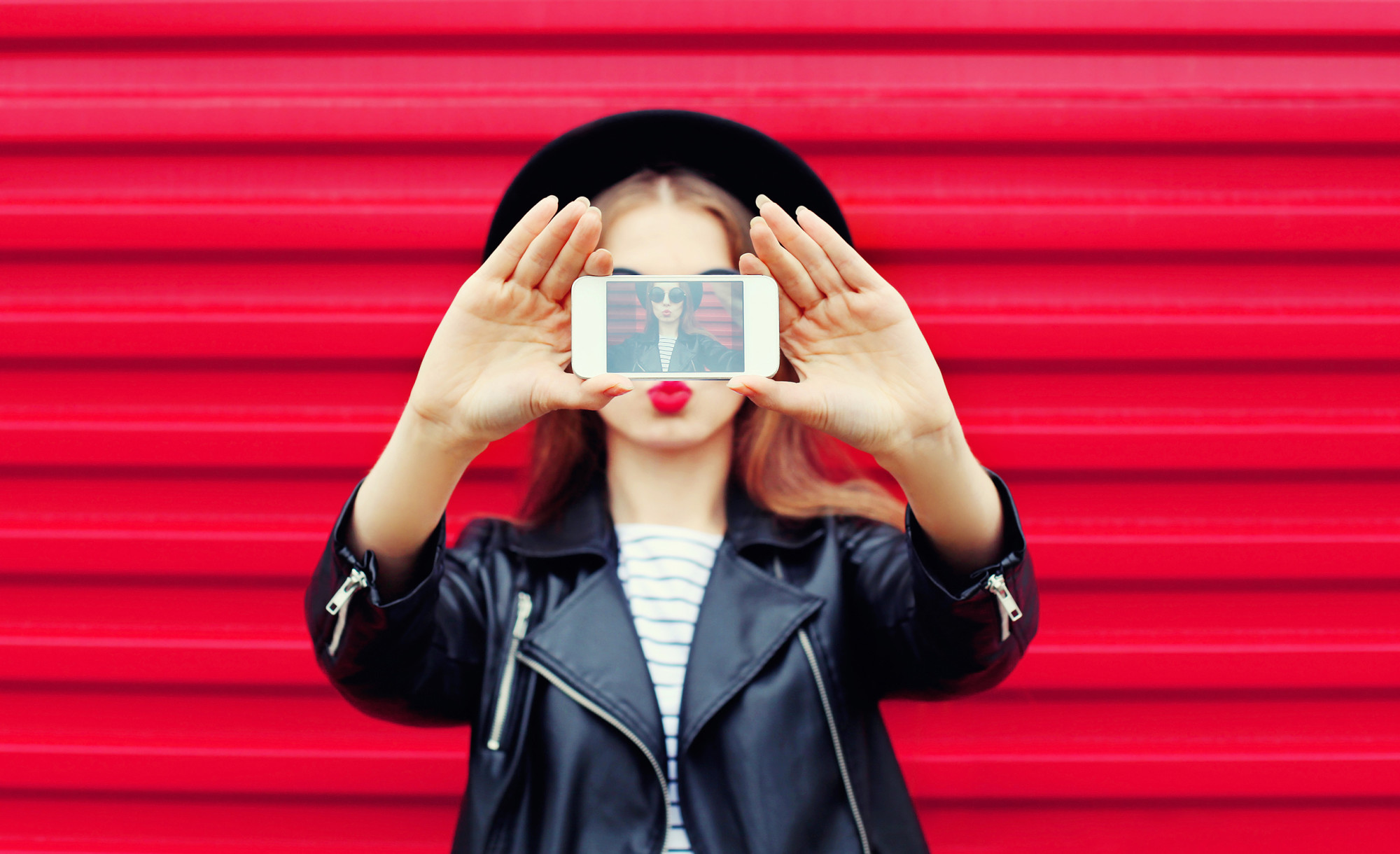 woman holding mobile phone